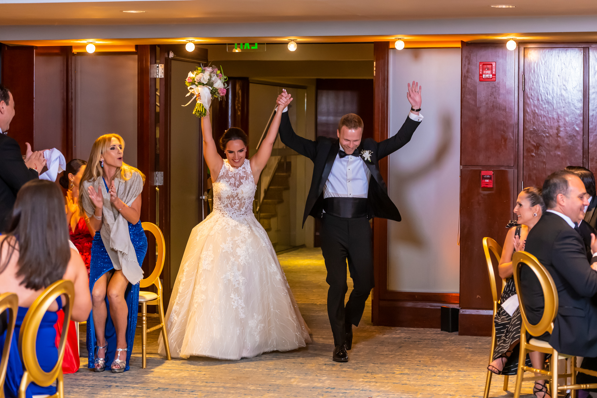 Newlyweds entering reception